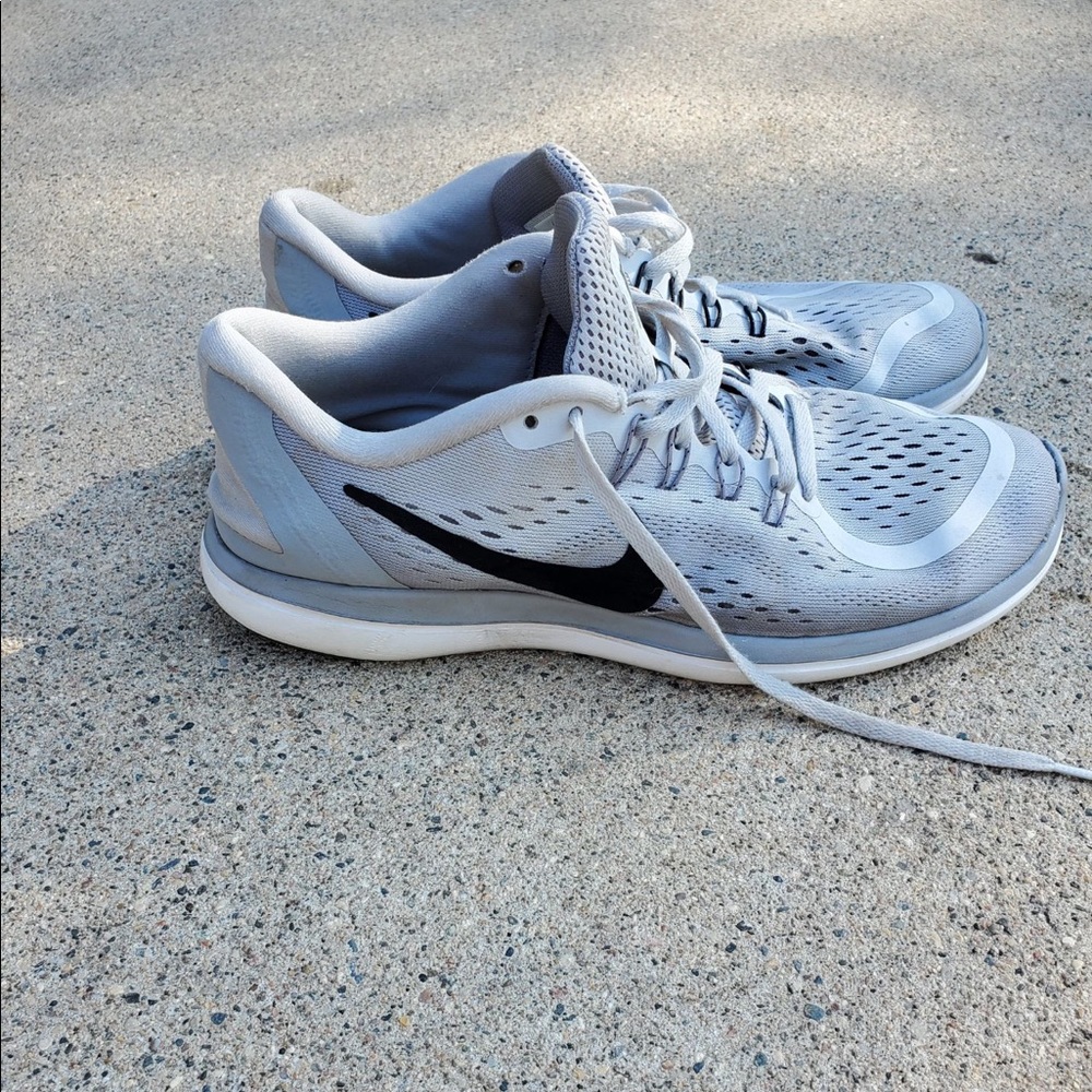 Light gray Nike tennis shoes